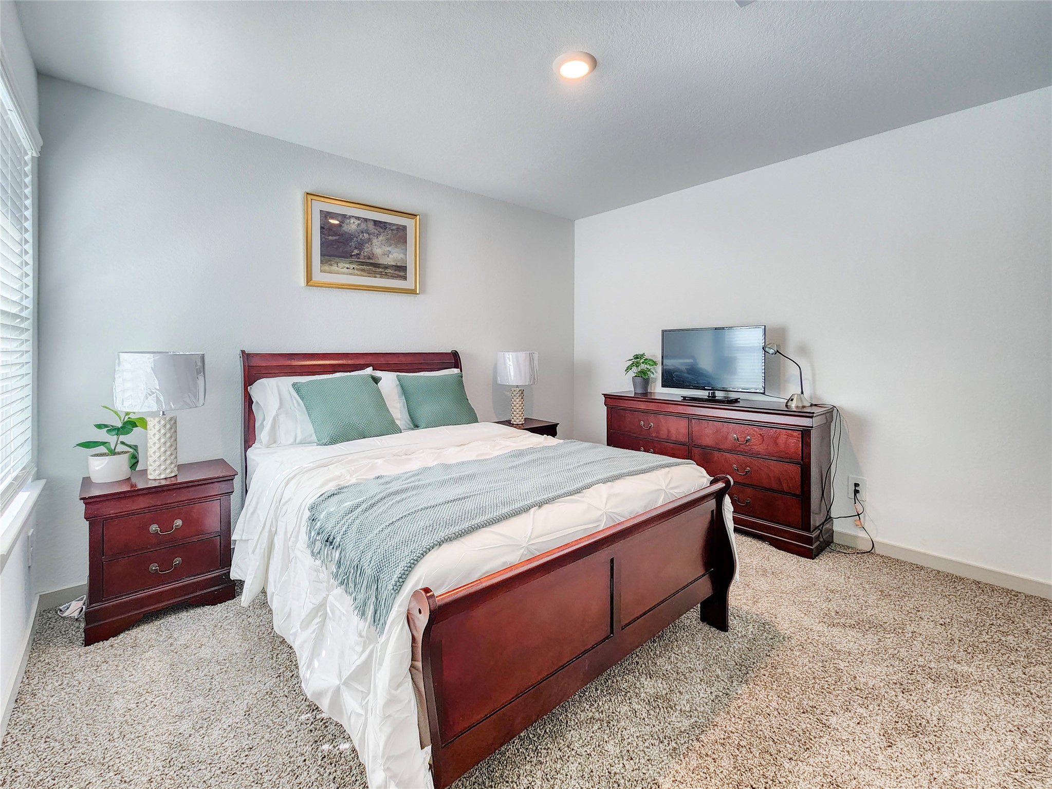 29914 Reagans Rnch Drive Katy, TX 77494 - Photo 22 of 45 a bedroom with a bed and a desk