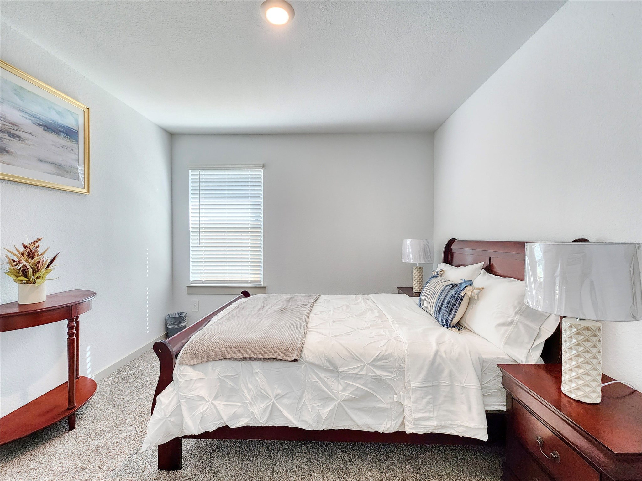 29914 Reagans Rnch Drive Katy, TX 77494 - Photo 24 of 45 a bedroom with a bed and a lamp