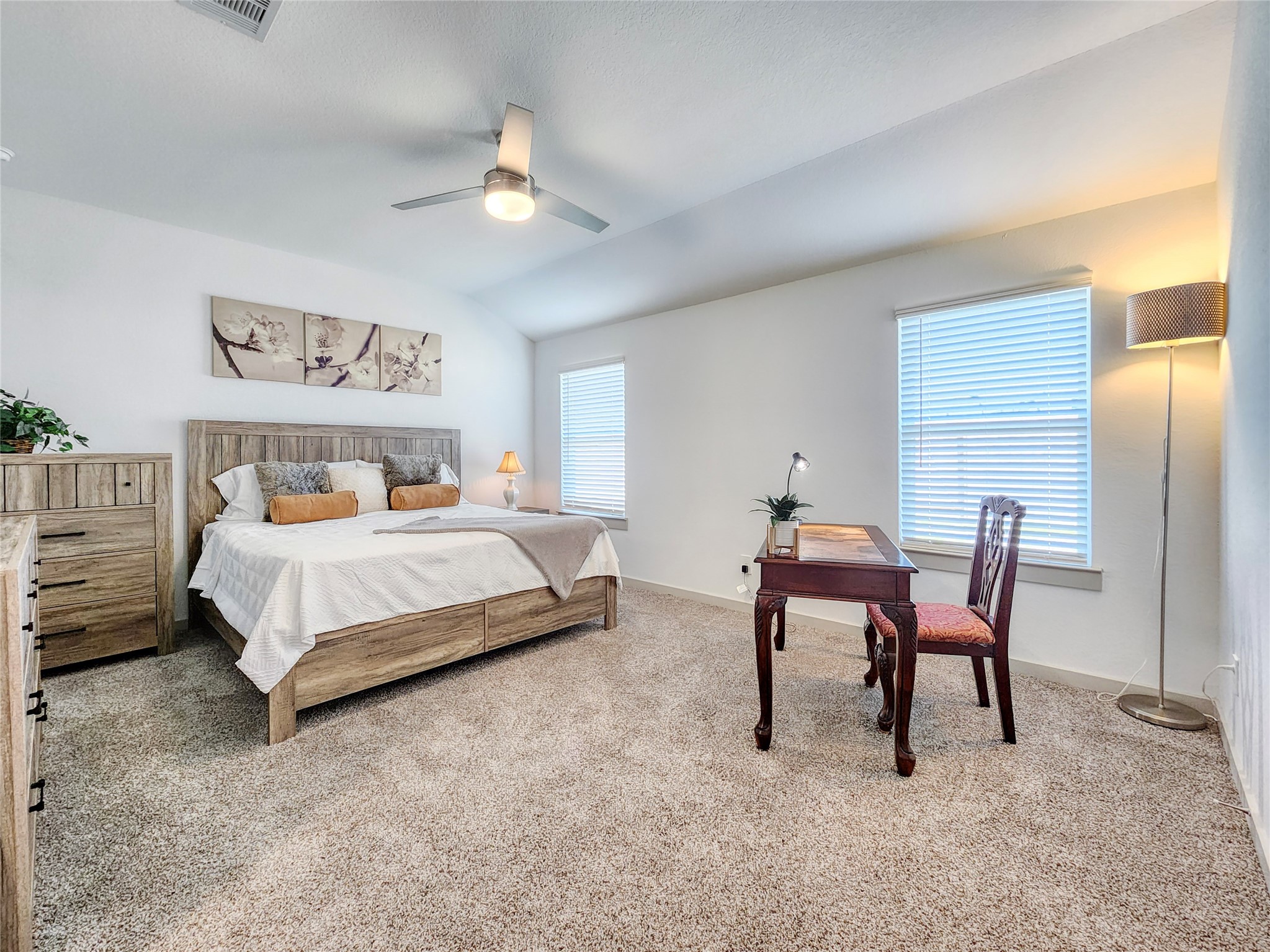 29914 Reagans Rnch Drive Katy, TX 77494 - Photo 30 of 45 a bedroom with a bed and a chair