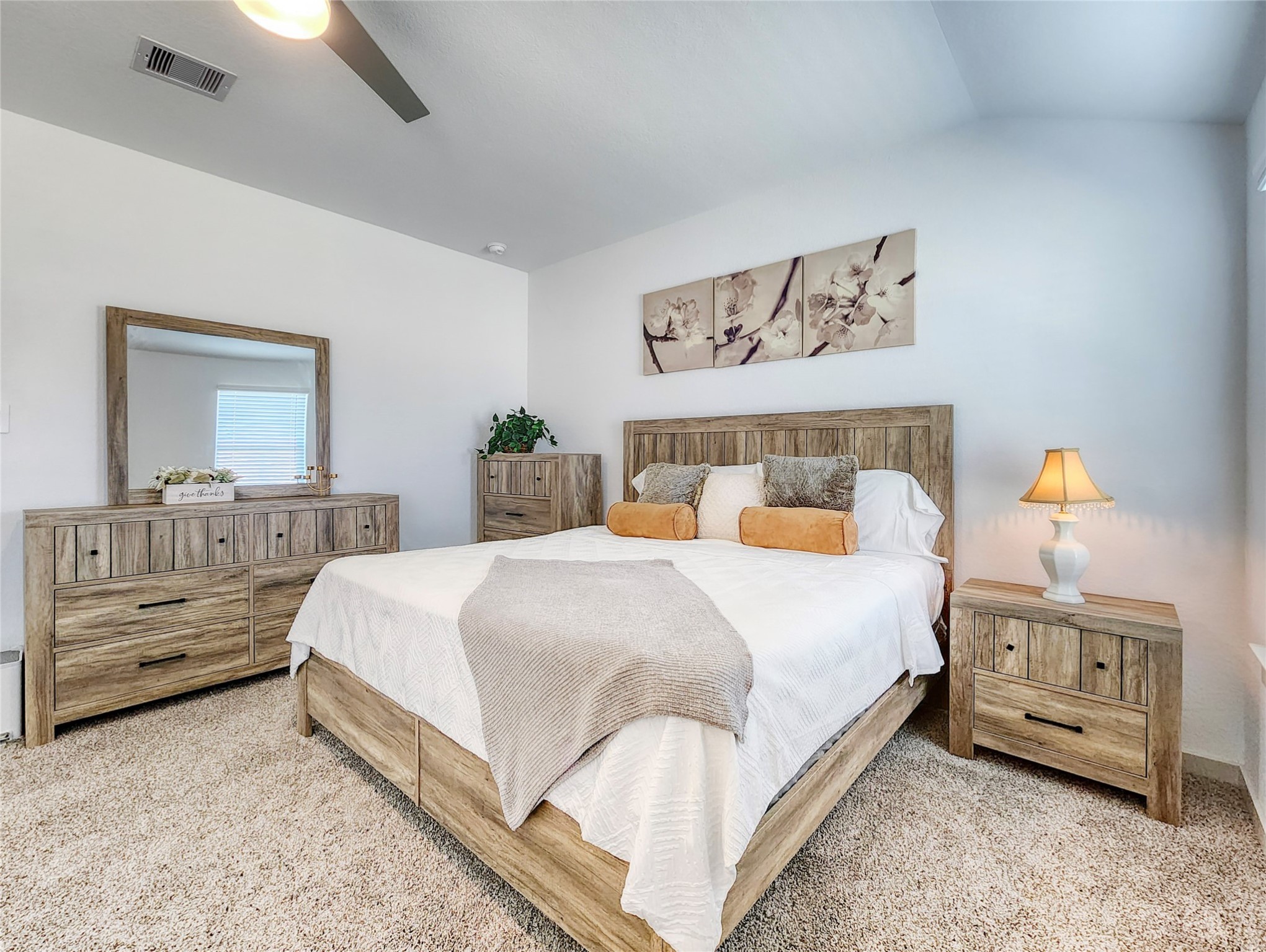 29914 Reagans Rnch Drive Katy, TX 77494 - Photo 32 of 45 a bedroom with a bed and a dresser in it