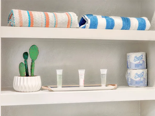 a bathroom with a toilet and a sink