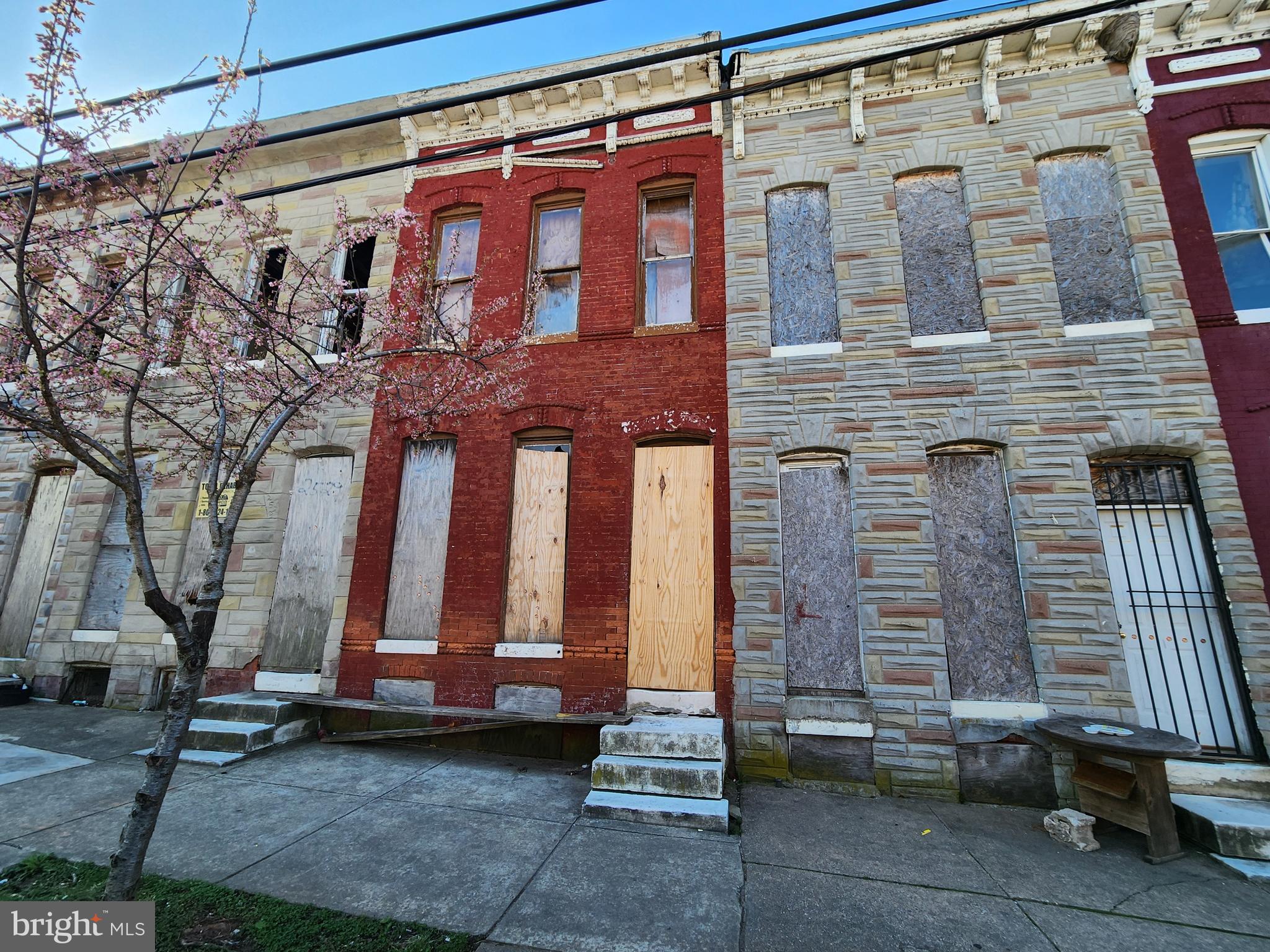 2527 East Oliver Street Baltimore, MD 21213 - Photo 3 of 4 a front view of a building