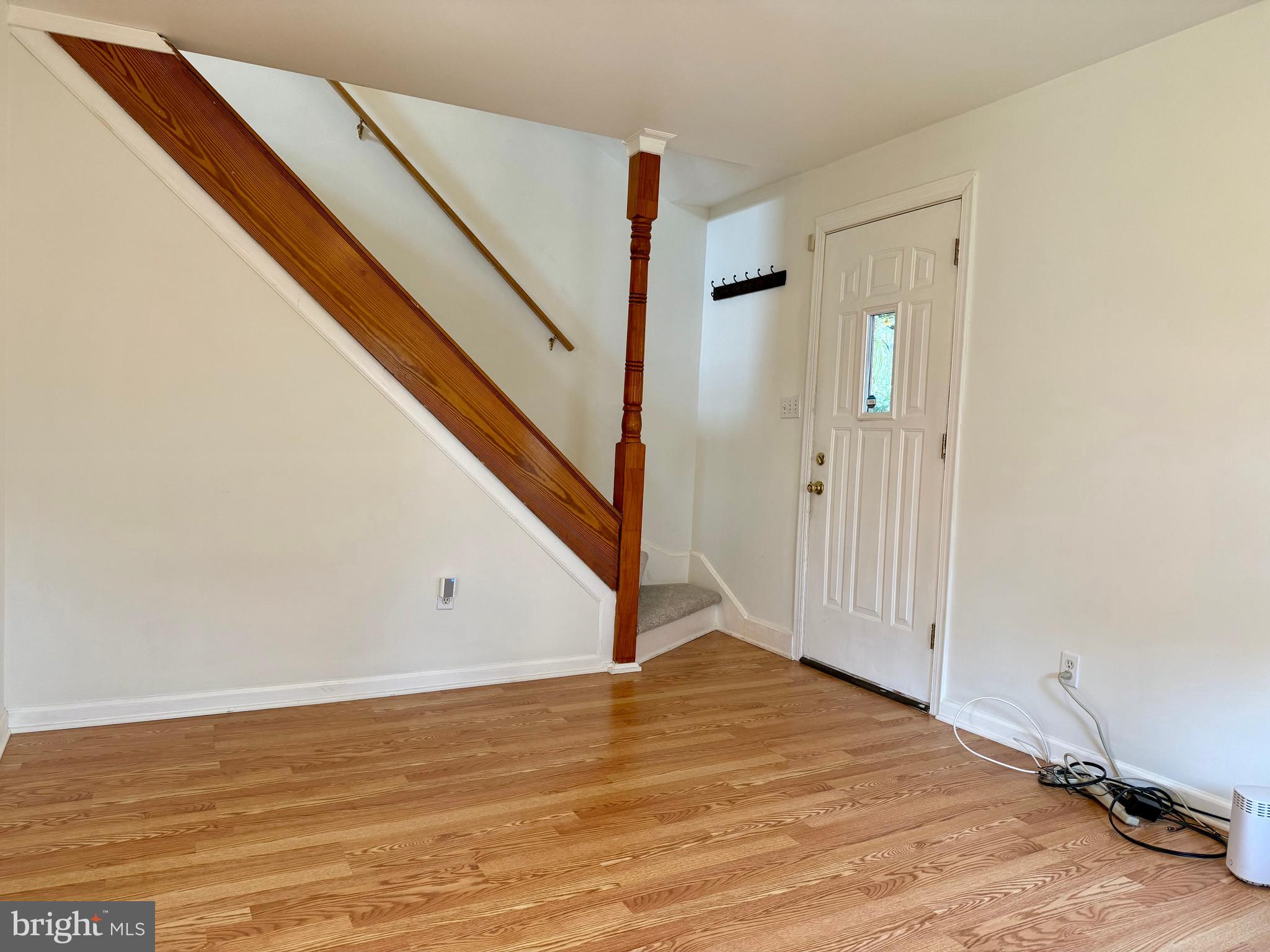 16 Portship Road Baltimore, MD 21222 - Photo 2 of 21 a view of an entryway with wooden floor