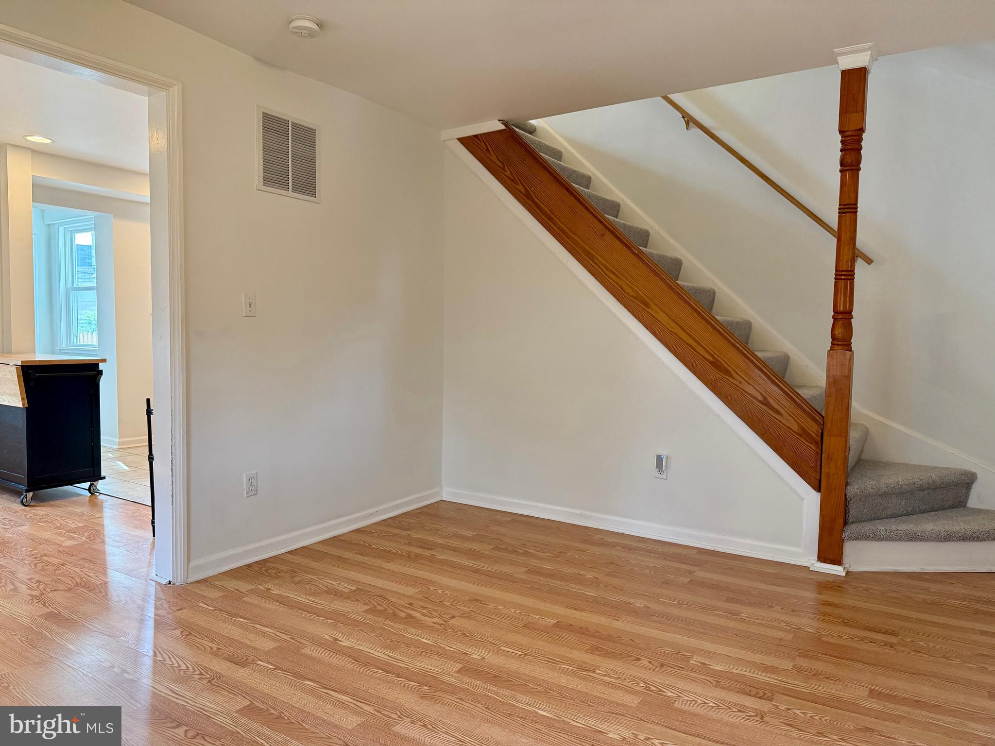 16 Portship Road Baltimore, MD 21222 - Photo 3 of 21 a view of a room with wooden floor and white walls