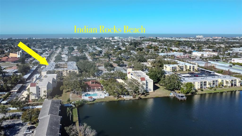 11485 Oakhurst Road, Unit 200114 Largo, FL 33774 - Photo 34 of 40 an aerial view of a city with lake view