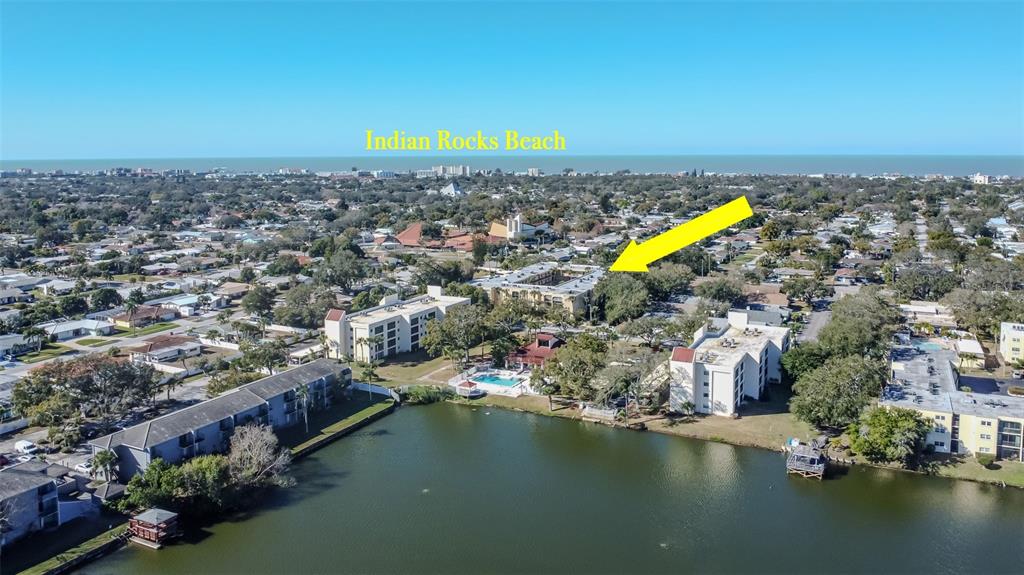 11485 Oakhurst Road, Unit 200114 Largo, FL 33774 - Photo 35 of 40 an aerial view of a city with lake view