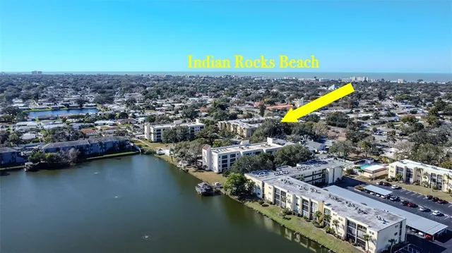 a view of a living room with a large window