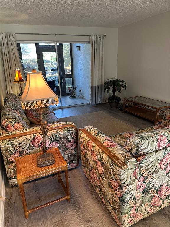 11485 Oakhurst Road, Unit 200114 Largo, FL 33774 - Photo 9 of 40 a room with musical instruments