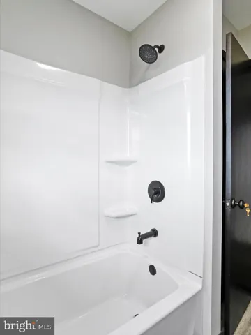 a bathroom with a tub
