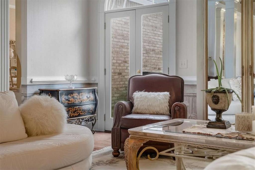 96 Windchime Way Northeast Rome, GA 30161 - Photo 12 of 57 a living room with furniture and a lamp