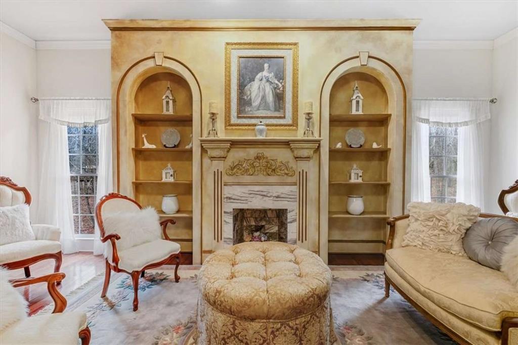 96 Windchime Way Northeast Rome, GA 30161 - Photo 29 of 57 a living room with furniture and a fireplace
