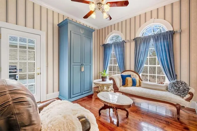 a view of walk in closet with clothes