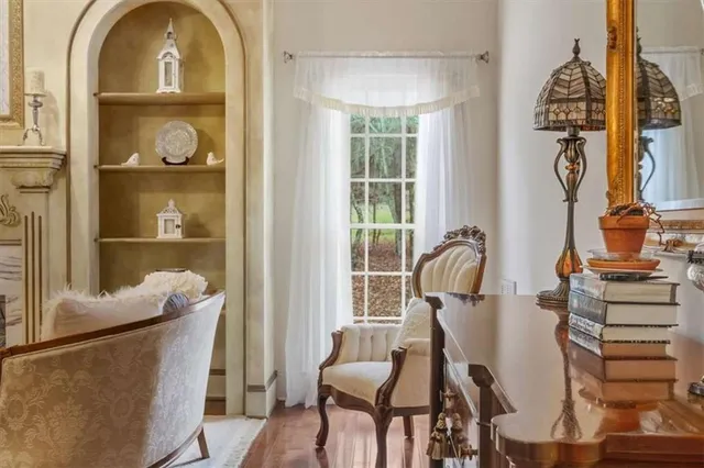 a bedroom with a bed and a night stand