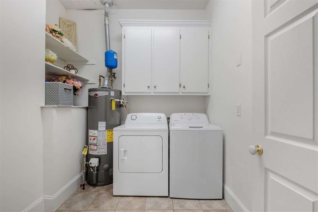 96 Windchime Way Northeast Rome, GA 30161 - Photo 41 of 57 a utility room with dryer and washer