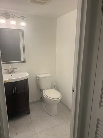 a bathroom with a sink and a toilet