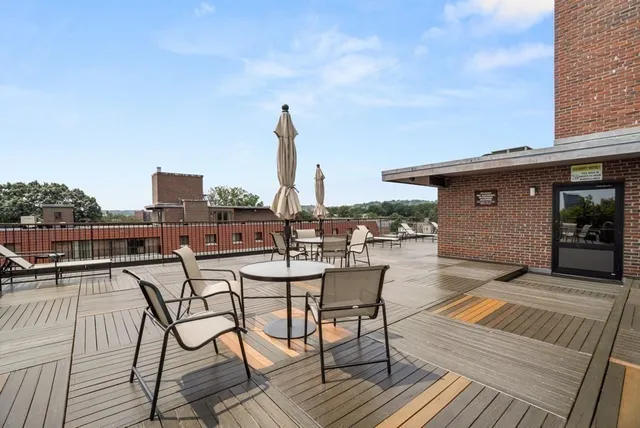 a view of a terrace with furniture