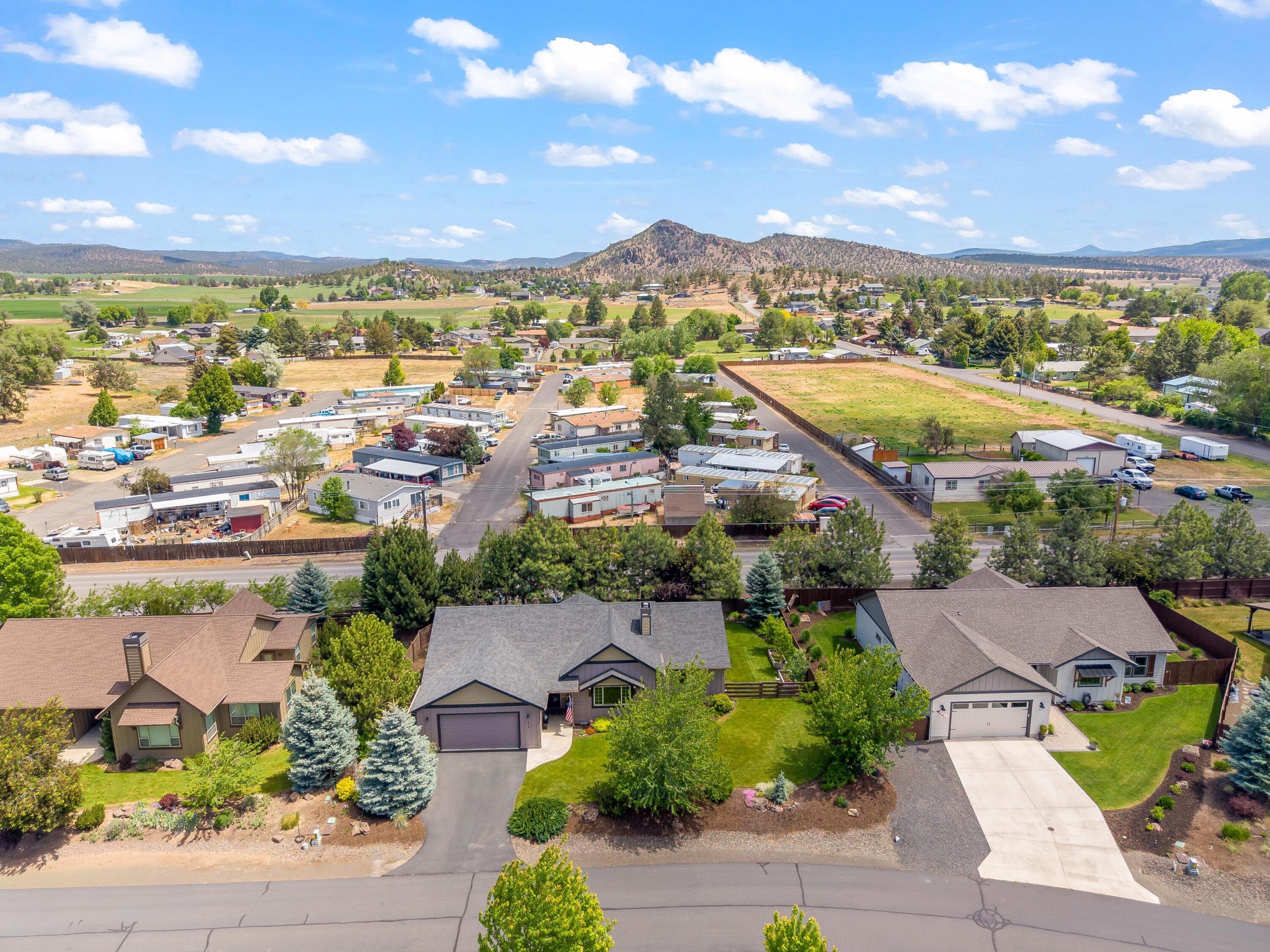 210 Northwest Saddle Ridge Loop Prineville, OR 97754 - Photo 32 of 38 an aerial view of residential houses with outdoor space and street view