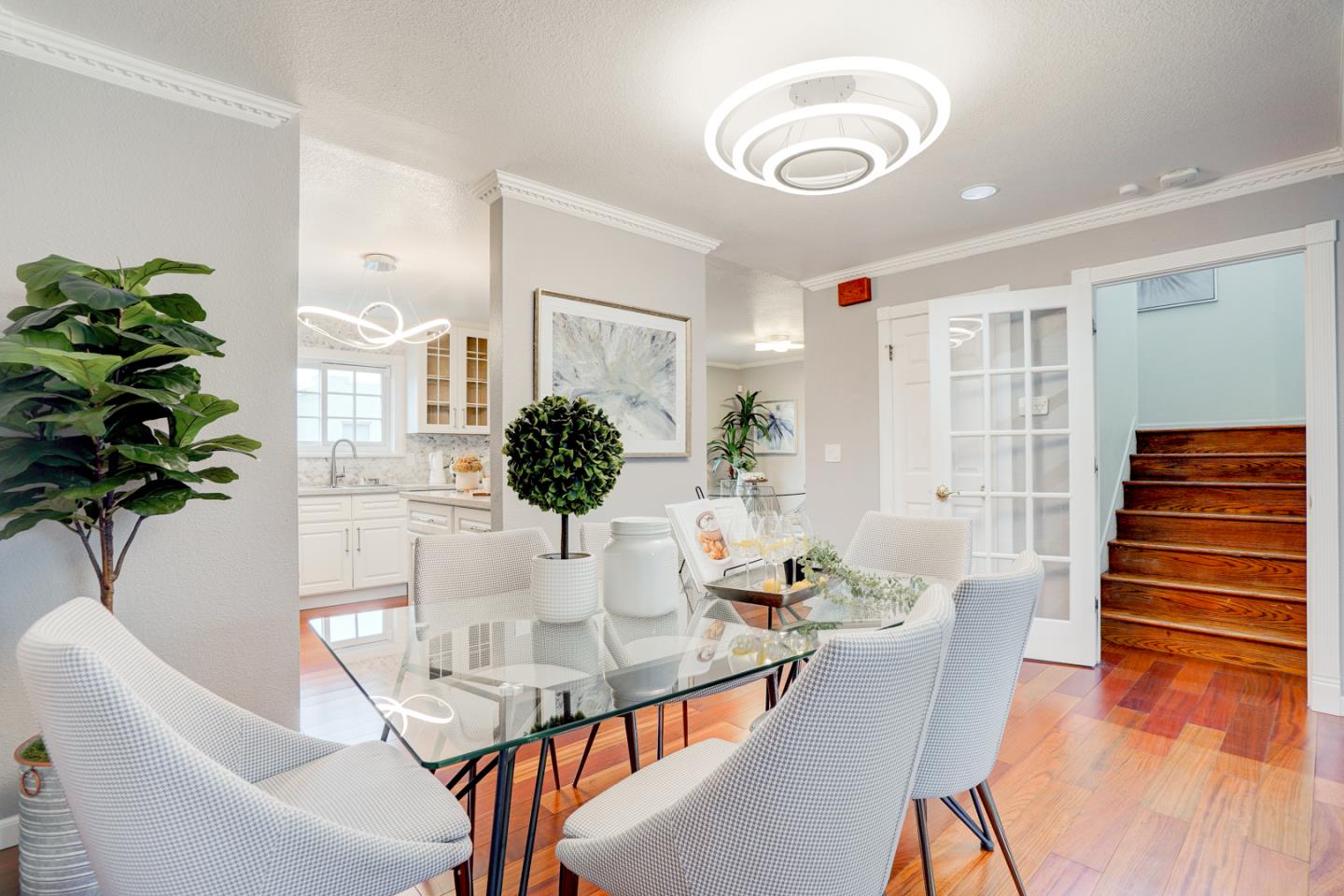 350 Buckingham Way Pacifica, CA 94044 - Photo 14 of 68 a view of a dining room with furniture and wooden floor