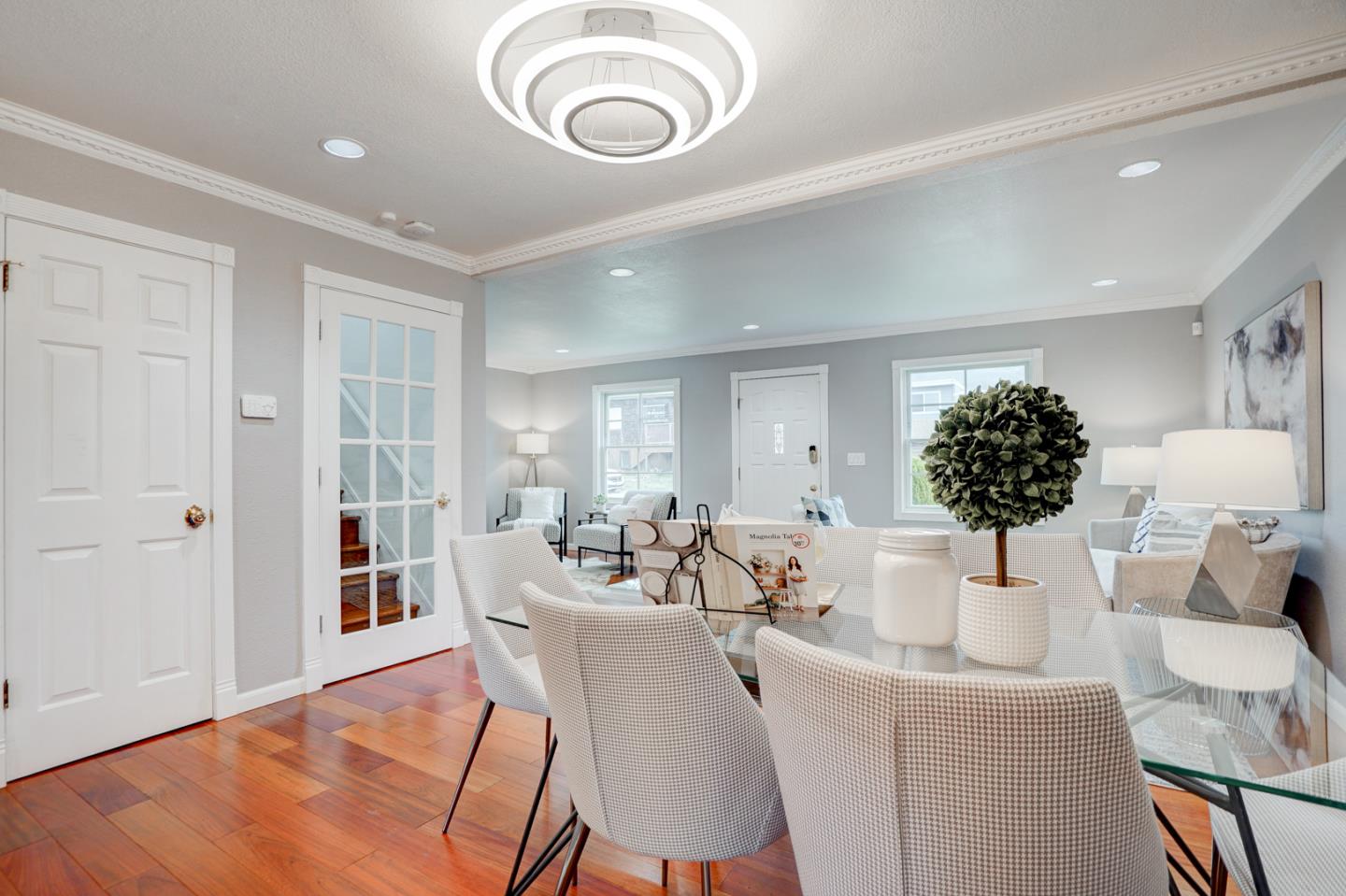 350 Buckingham Way Pacifica, CA 94044 - Photo 16 of 68 a living room with furniture and a large mirror