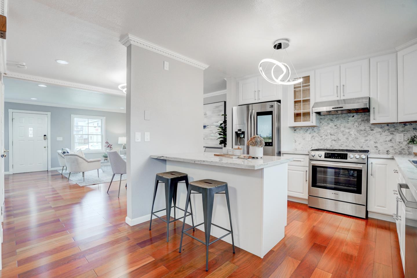 350 Buckingham Way Pacifica, CA 94044 - Photo 20 of 68 a kitchen with stainless steel appliances granite countertop a stove a sink dishwasher and a refrigerator with wooden floor