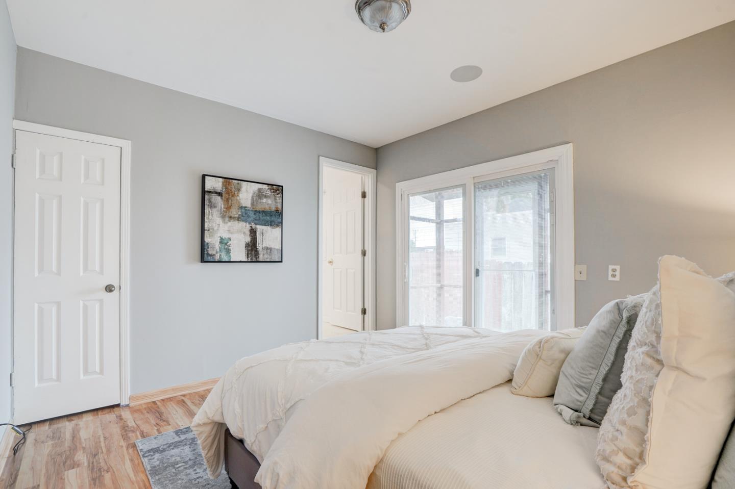 350 Buckingham Way Pacifica, CA 94044 - Photo 30 of 68 a bedroom with a bed and a window