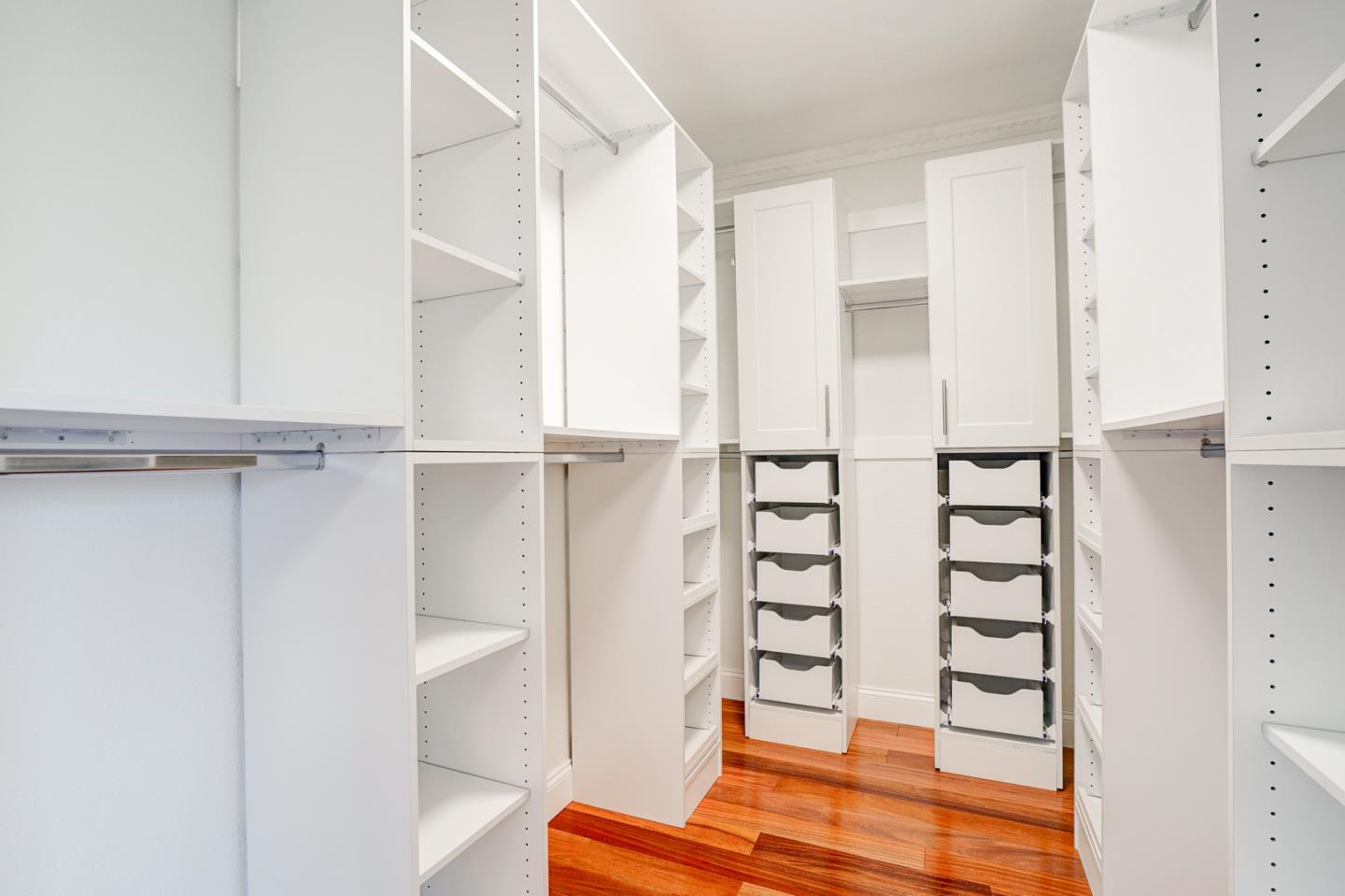350 Buckingham Way Pacifica, CA 94044 - Photo 39 of 68 a view of walk in closet with empty racks