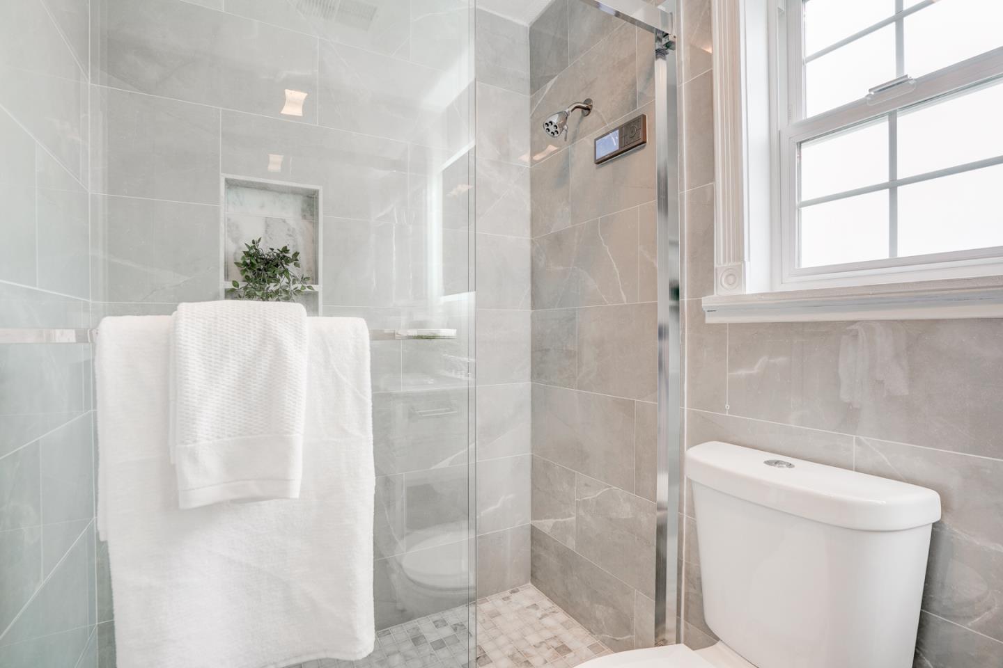 350 Buckingham Way Pacifica, CA 94044 - Photo 43 of 68 a bathroom with a shower and a toilet