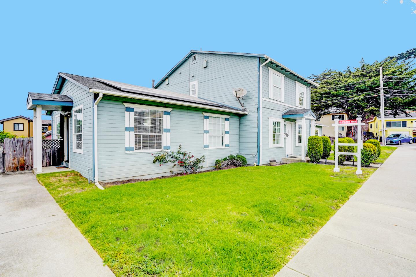 350 Buckingham Way Pacifica, CA 94044 - Photo 54 of 68 a front view of house with yard and outdoor seating