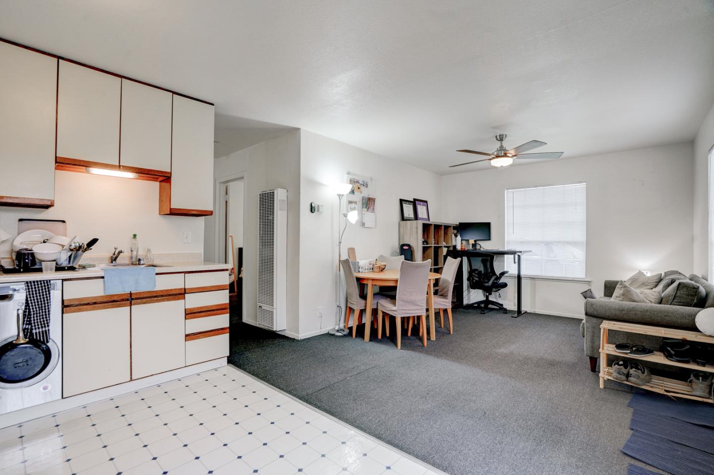 350 Buckingham Way Pacifica, CA 94044 - Photo 57 of 68 a kitchen with stainless steel appliances kitchen island granite countertop a sink a stove a dining table and chairs