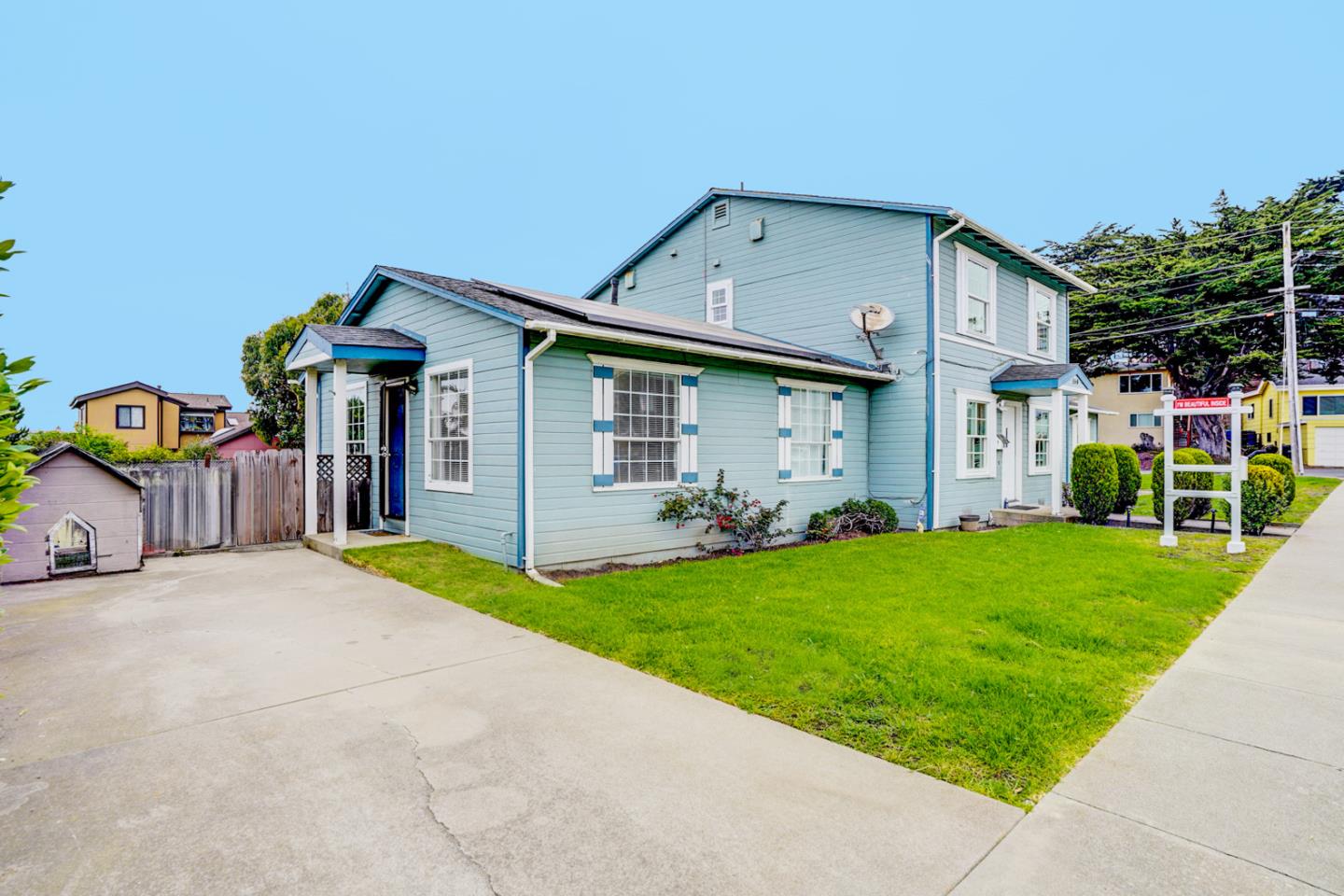 350 Buckingham Way Pacifica, CA 94044 - Photo 60 of 68 a front view of house with yard and outdoor seating