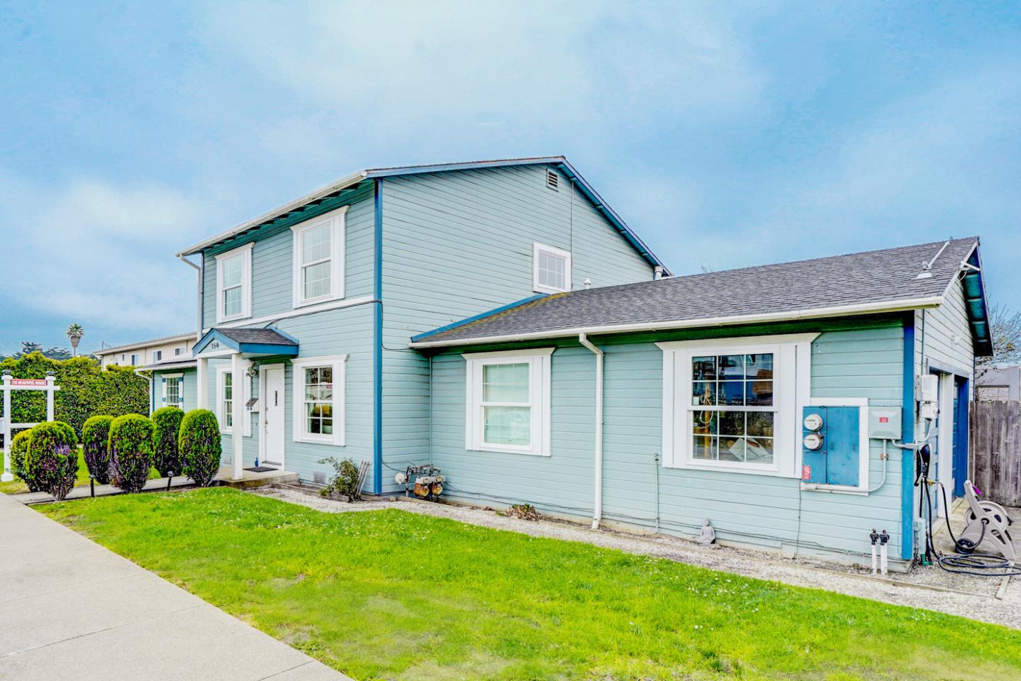 350 Buckingham Way Pacifica, CA 94044 - Photo 61 of 68 a front view of a house with a yard