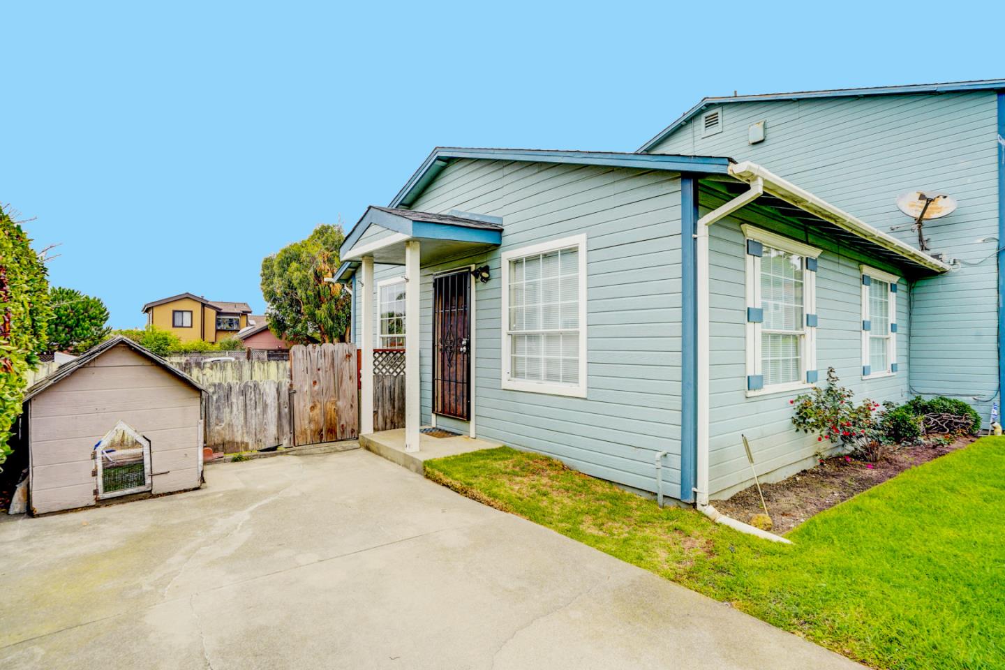 350 Buckingham Way Pacifica, CA 94044 - Photo 63 of 68 a front view of a house with garden