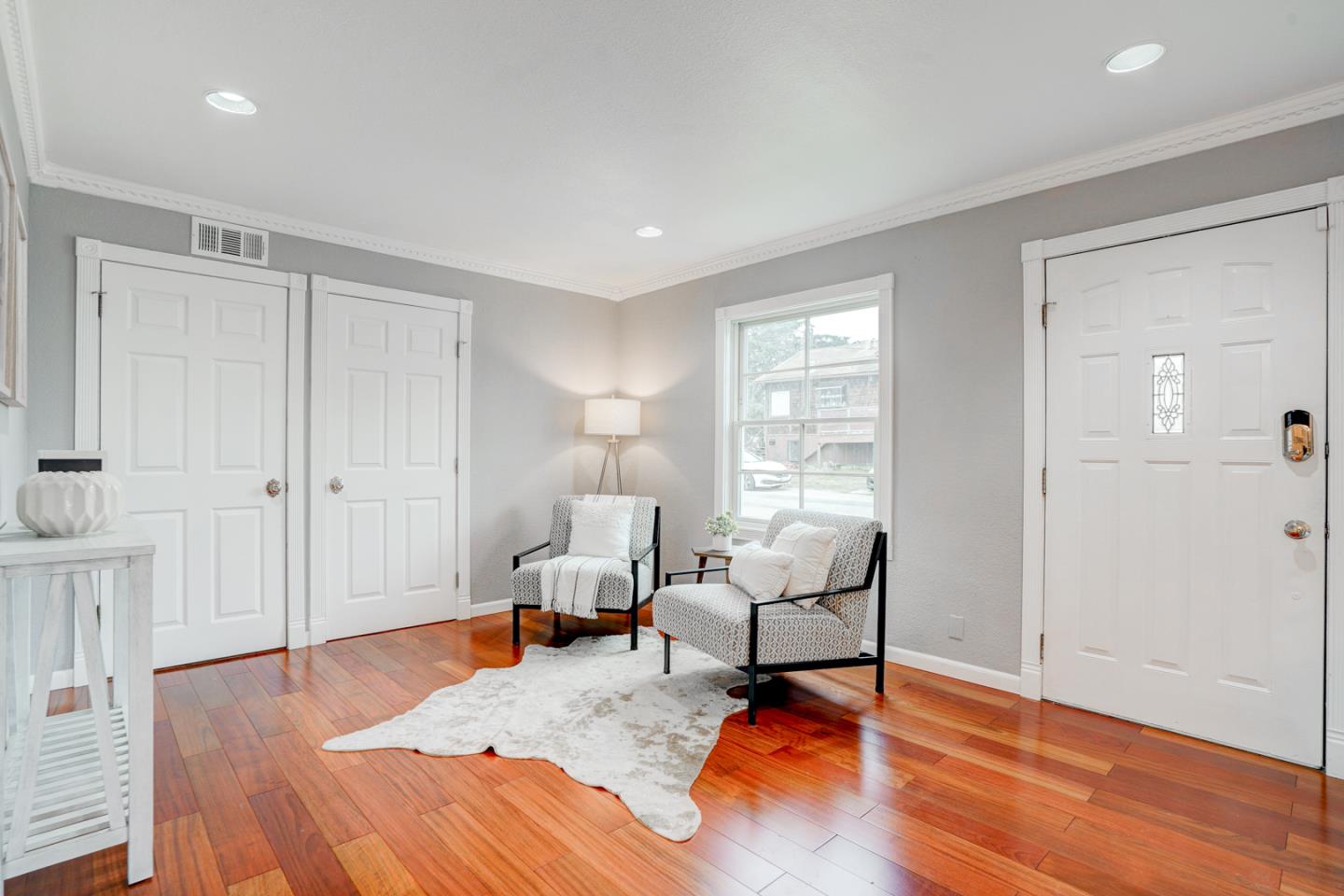 350 Buckingham Way Pacifica, CA 94044 - Photo 8 of 68 a living room with furniture and a wooden floor