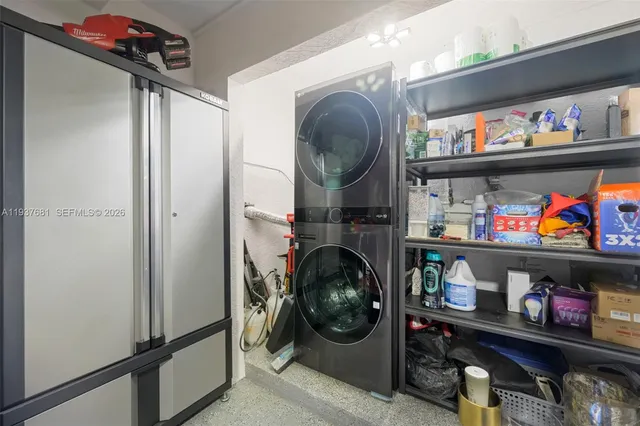 a storage room with washer and dryer
