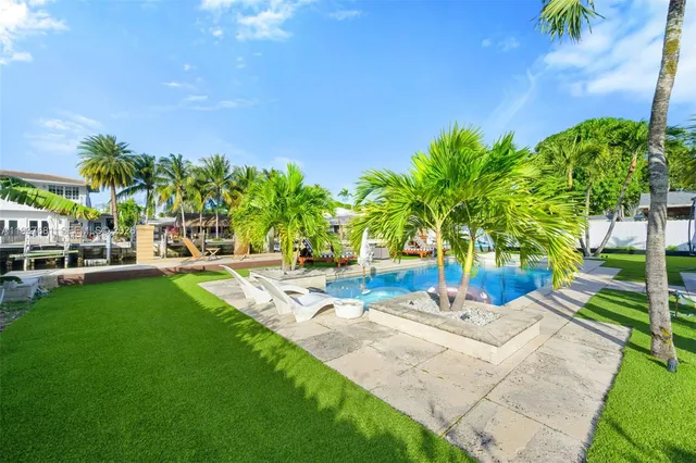 a view of yard with patio