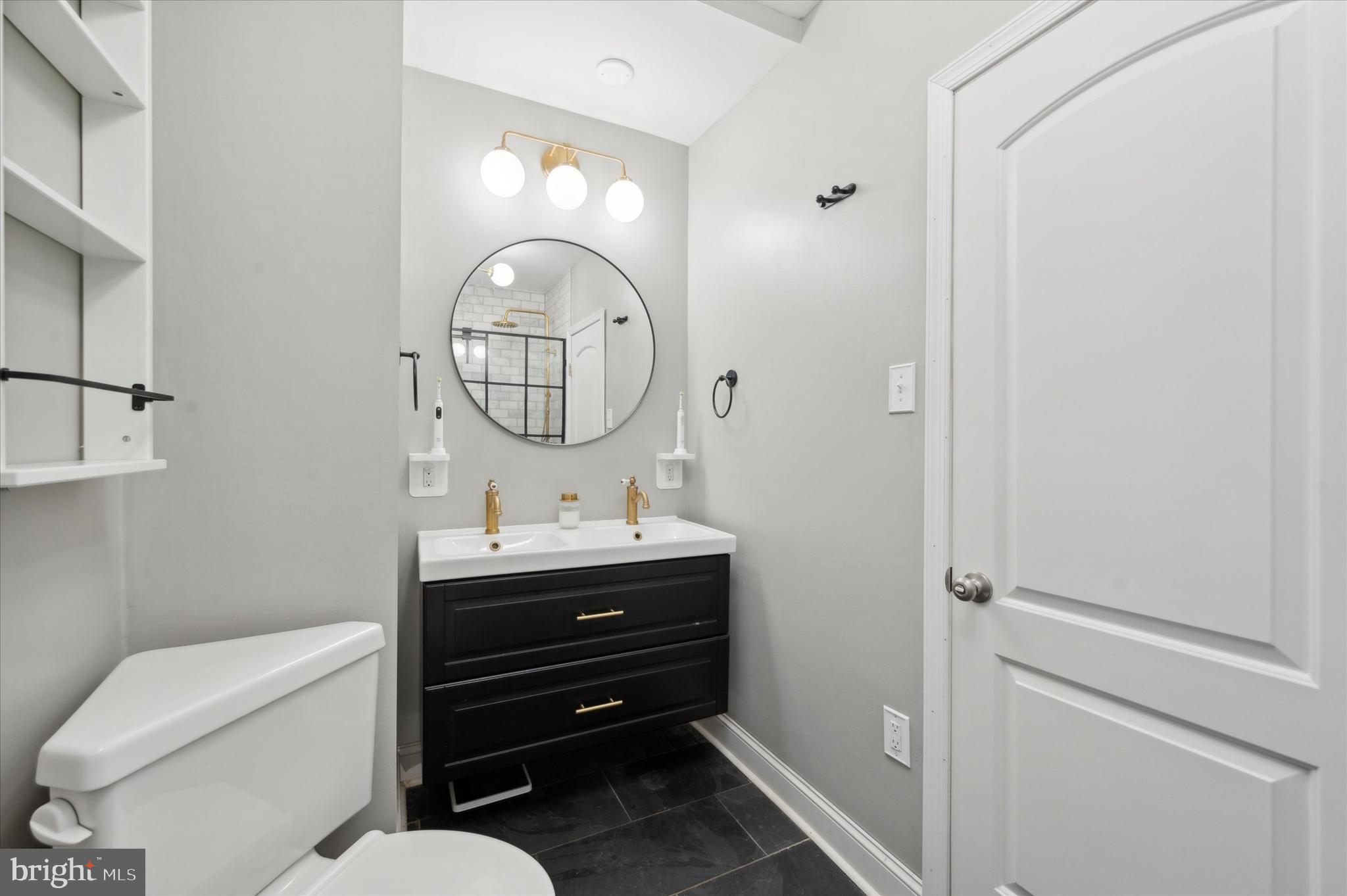 1415 Tasker Street Philadelphia, PA 19145 - Photo 18 of 27 Dynamic Hall Bath With Slate Flooring