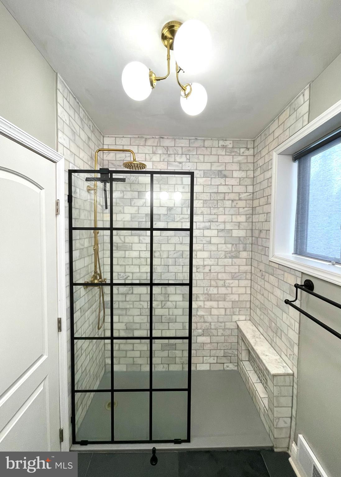 1415 Tasker Street Philadelphia, PA 19145 - Photo 20 of 27 Sleek Fixed Glass Shower Panel