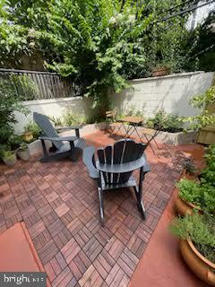 1415 Tasker Street Philadelphia, PA 19145 - Photo 25 of 27 Summer Scene of Enclosed Patio
