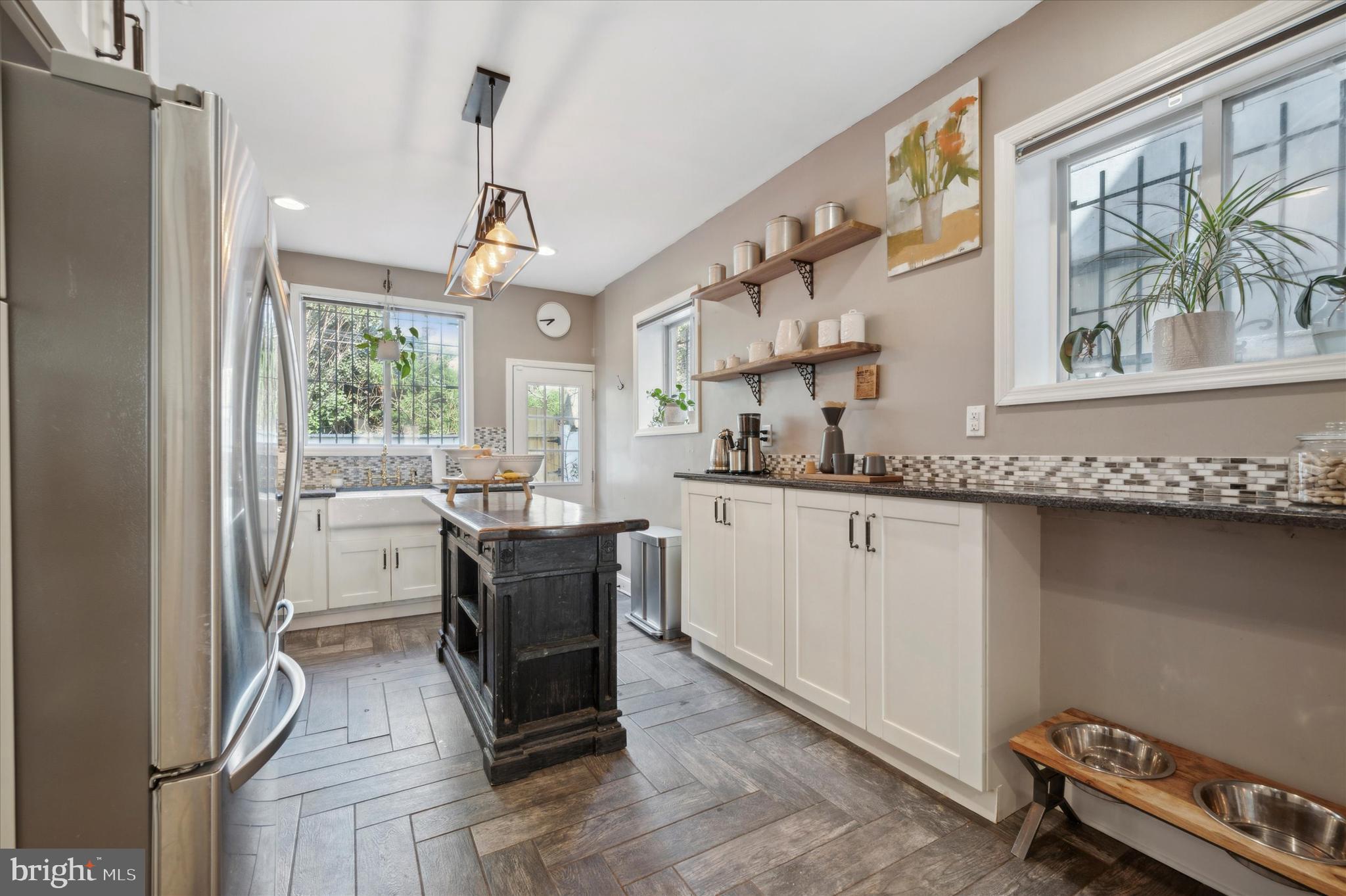 1415 Tasker Street Philadelphia, PA 19145 - Photo 8 of 27 Sunny Kitchen With Herringbone Tile