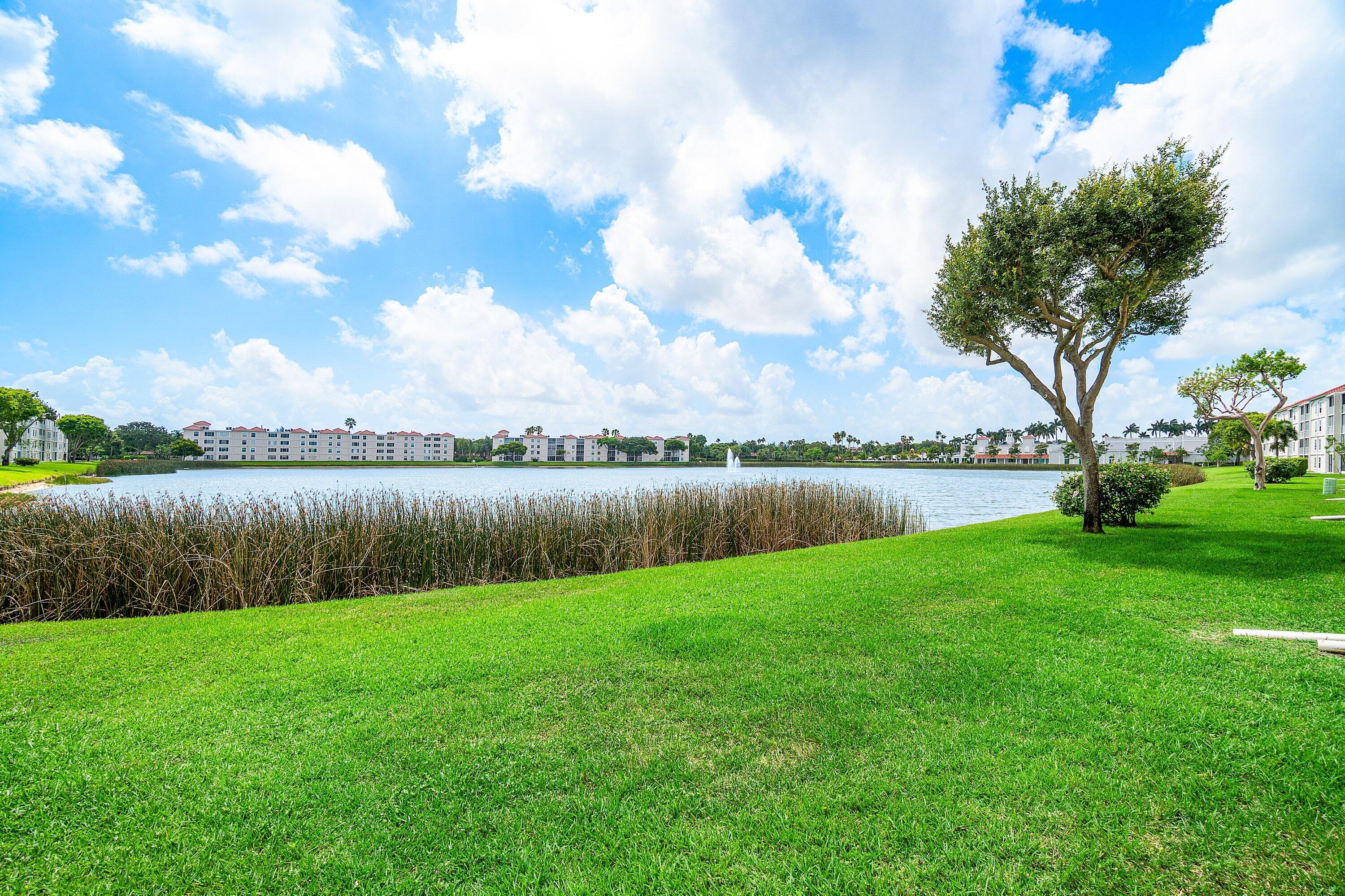 14096 Huntington Pointe Drive, Unit 106 Delray Beach, FL 33484 - Photo 42 of 47 a view of a lake