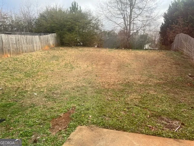 a street view with wooden fence
