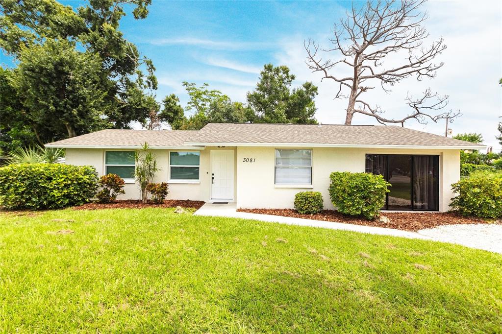 3081 Englewood Road Venice, FL 34293 - Photo 1 of 1 a view of a house with a yard patio and swimming pool