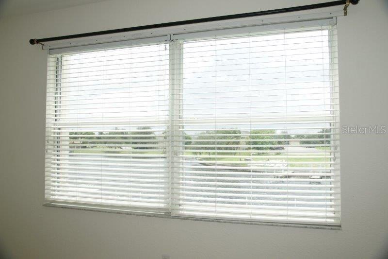 268 Lewis Circle, Unit 121 Punta Gorda, FL 33950 - Photo 15 of 27 a view of a room that has a window in it
