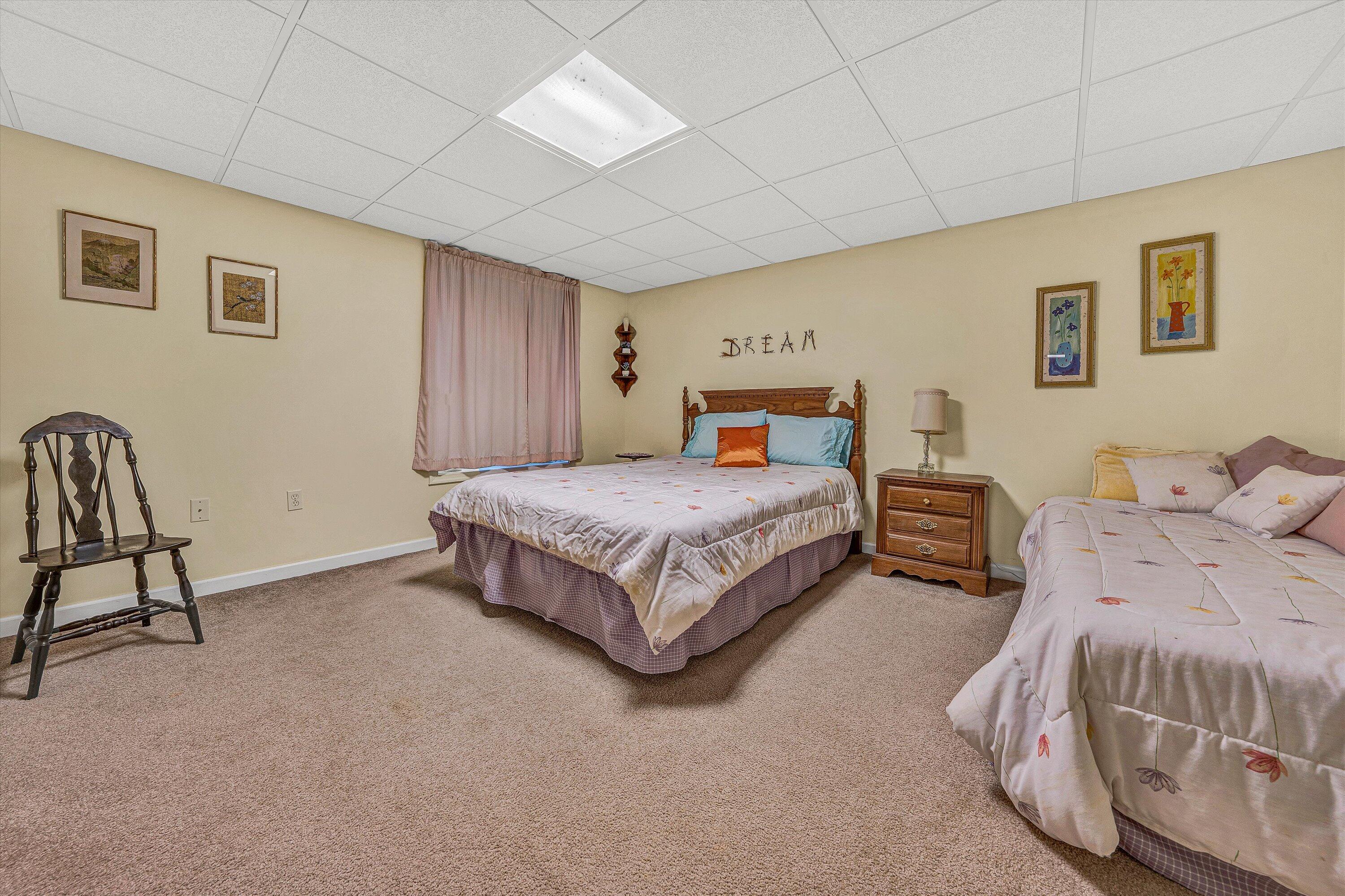 56 Scarlet Street Hardy, VA 24101 - Photo 24 of 42 a bedroom with a bed and a table