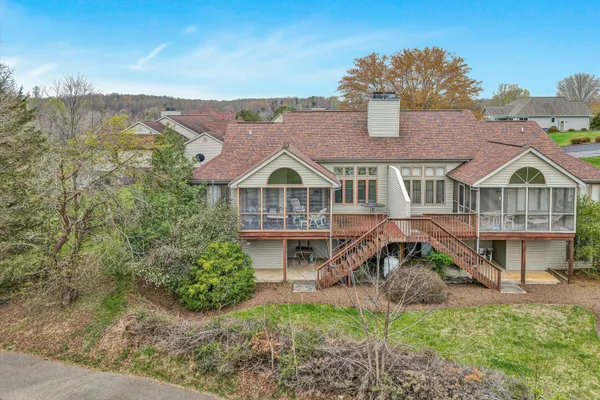 a view of house with garden