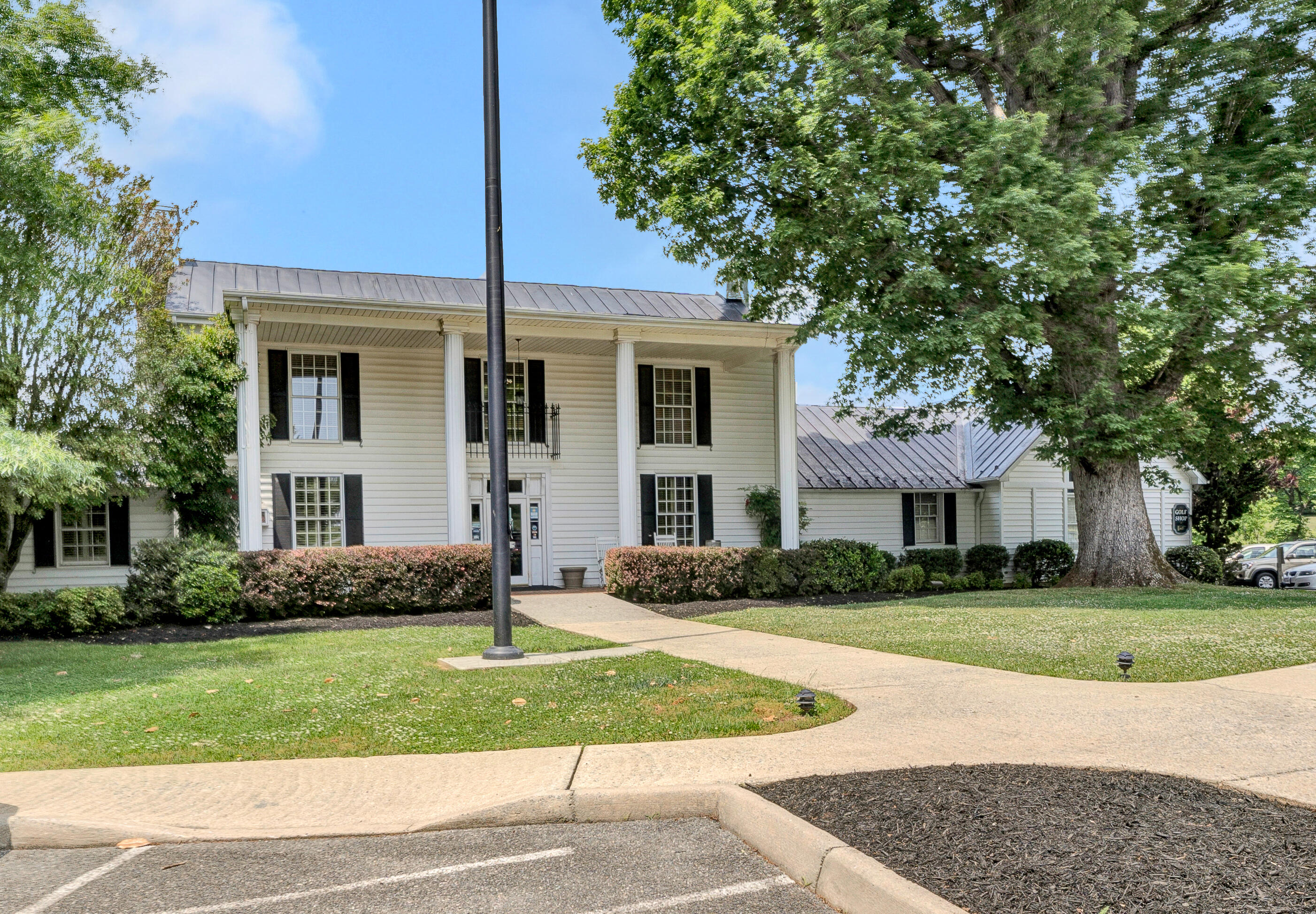 56 Scarlet Street Hardy, VA 24101 - Photo 40 of 42 a front view of a house with garden