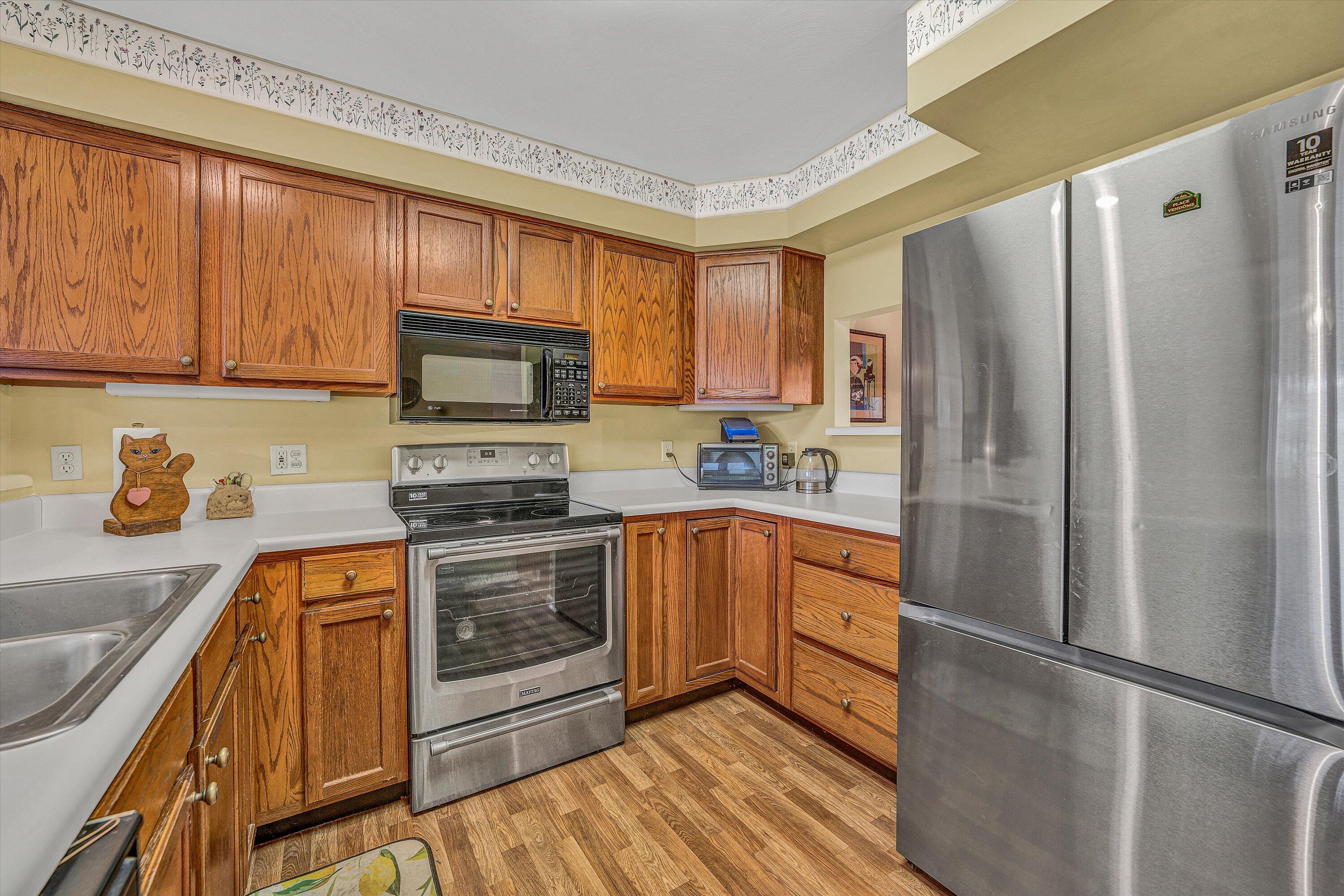 56 Scarlet Street Hardy, VA 24101 - Photo 10 of 42 a kitchen with stainless steel appliances granite countertop a refrigerator stove and sink