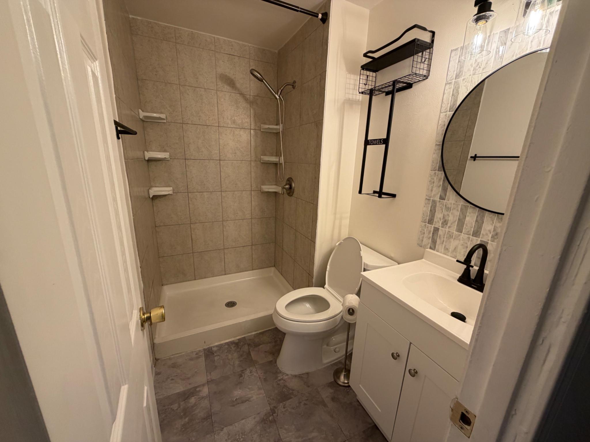 2861 Ridge Road Waldorf, MD 20603 - Photo 17 of 49 Modern basement bathroom with sleek finishes.