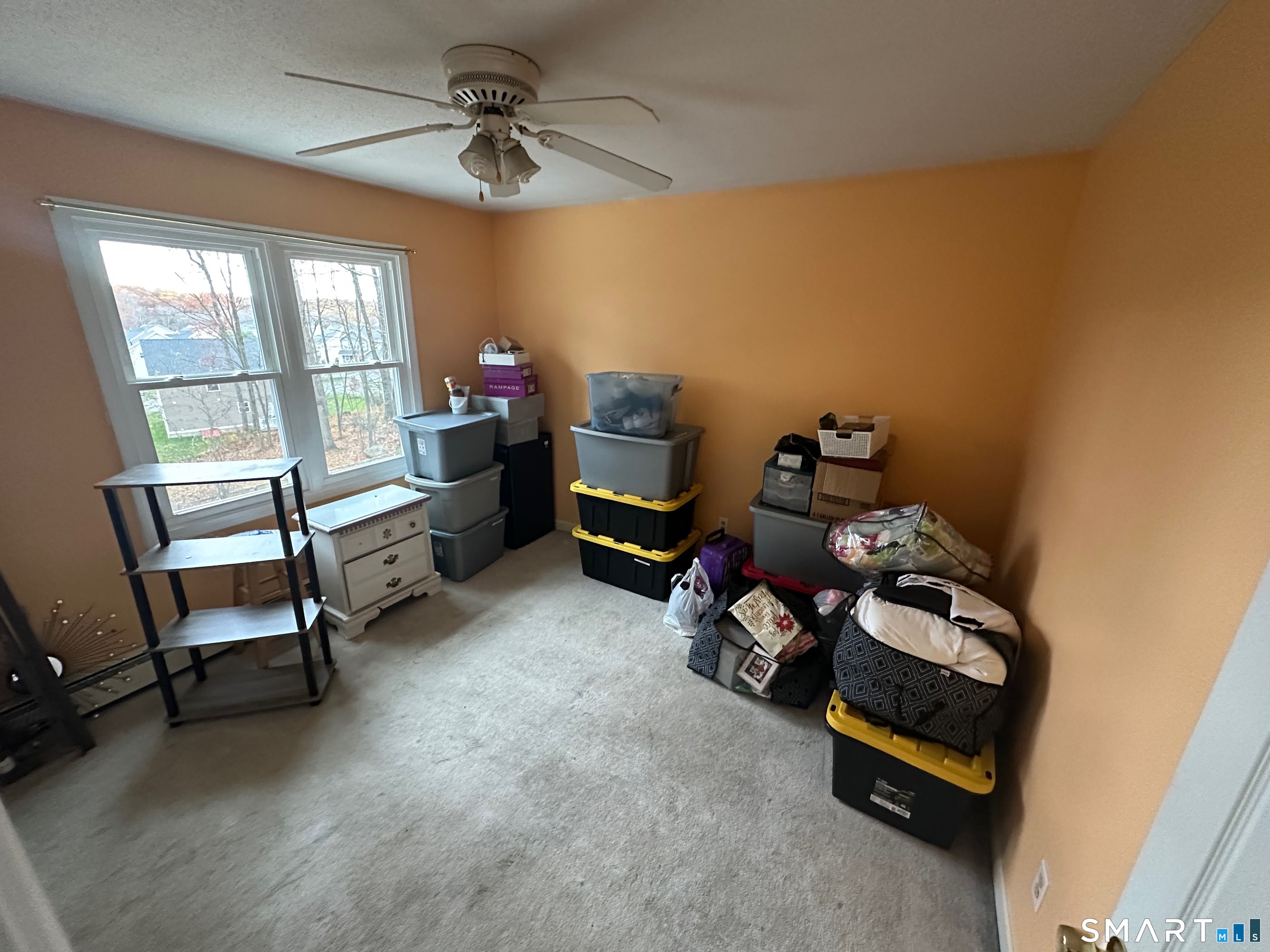 120 Tyler Way Bristol, CT 06010 - Photo 15 of 40 a bedroom with furniture and a window