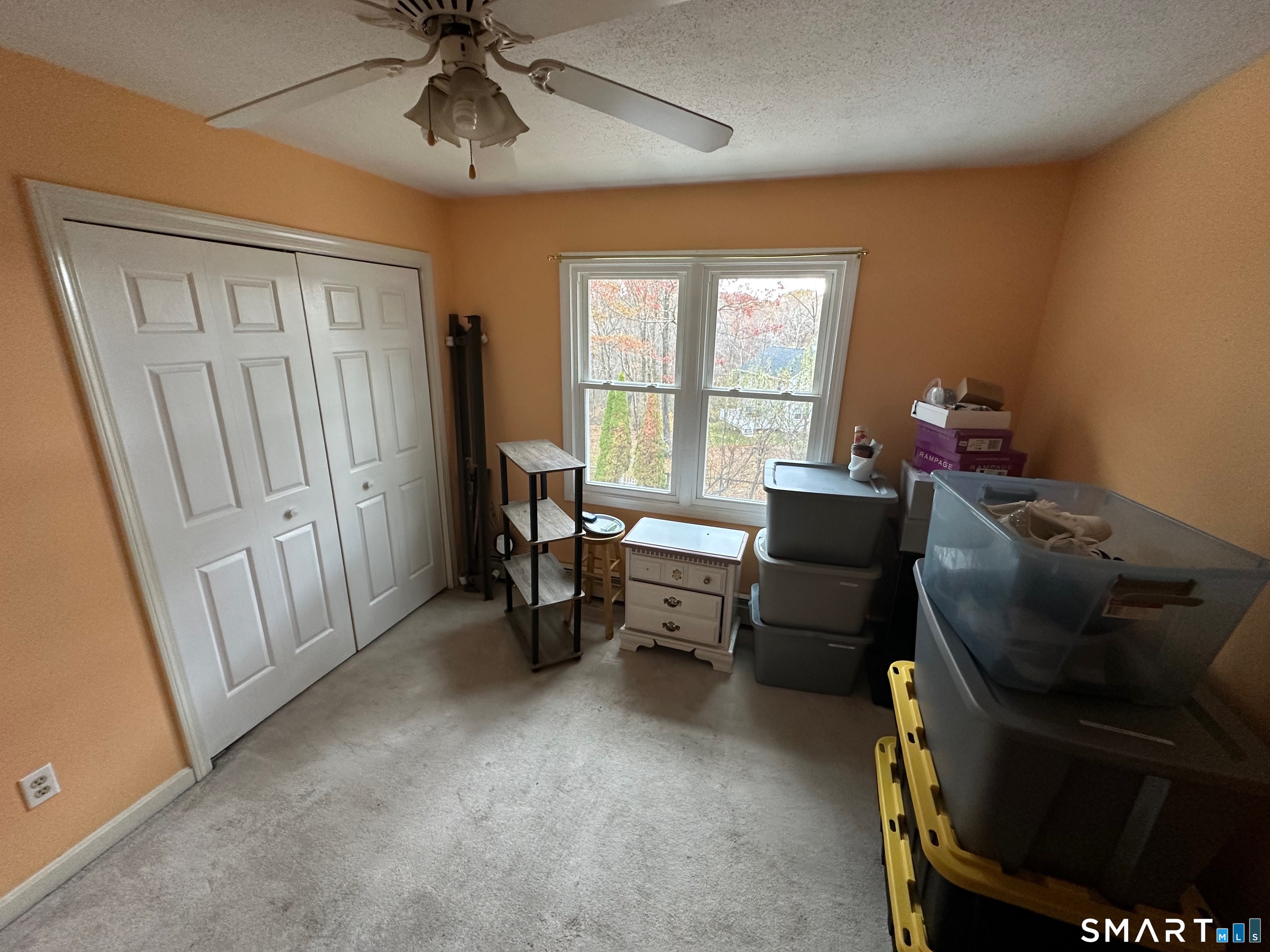 120 Tyler Way Bristol, CT 06010 - Photo 16 of 40 a living room with furniture and a window